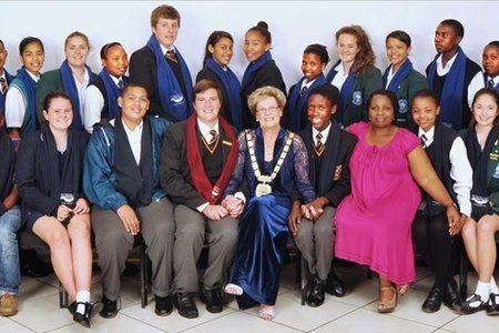 Overstrand’s 2014/2015 Junior Town Council in the company of the Mayor Nicolette Botha-Guthrie and JTC Manager Unity Mtomile. From Hawston Secondary School: Elgermine Fourie (Deputy Jnr. Mayor), Shani Arendse, Sherilene Botha, Reagan Fortuin, Jenny-Lee Hartnick, Agnesia Konstabel and Alfonso Williams (Executive Member). From Hermanus High: Natalie Austin (Executive Member), Elani Groenewald, Amy Hess, Misha van Zyl and Monique Vermeulen (Executive Member). From Qhayiya Secondary School: Jennifer Funda (Executive Member), Zizibele Gashe, Botleng Kayeki, Nezisa Mgqeba,  Zubenathi Sofute,  Athini Tshwalakhe  (Executive Member) and Norman Zininga. From Gansbaai Academia: Johan van der Merwe (Jnr. Mayor), Analo Yawa (Deputy Jnr. Mayor), Marcel Colleen Dickson, Stefan Joubert, Jemaine Jack Julies, Amy Thandi Wolhuter and Khanya Xhalisile. From Northlink College: Nicole Blignaut, Hope Botes, Matthew Jones and Ignesius Matema (Executive Member). From Curro Hermanus: Inez Mallandain (Executive Member) and Tyde-Summer Turck.